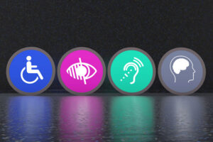 Vier bunte Kreise auf dunklem Hintergrund auf denen Symbole für Barrierefreiheit zu sehen sind.