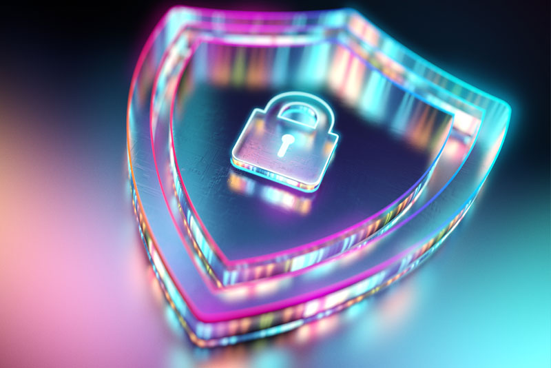 Ein Schildsymbol aus Glas in 3D auf dem ein Schloss Symbol eingraviert ist.